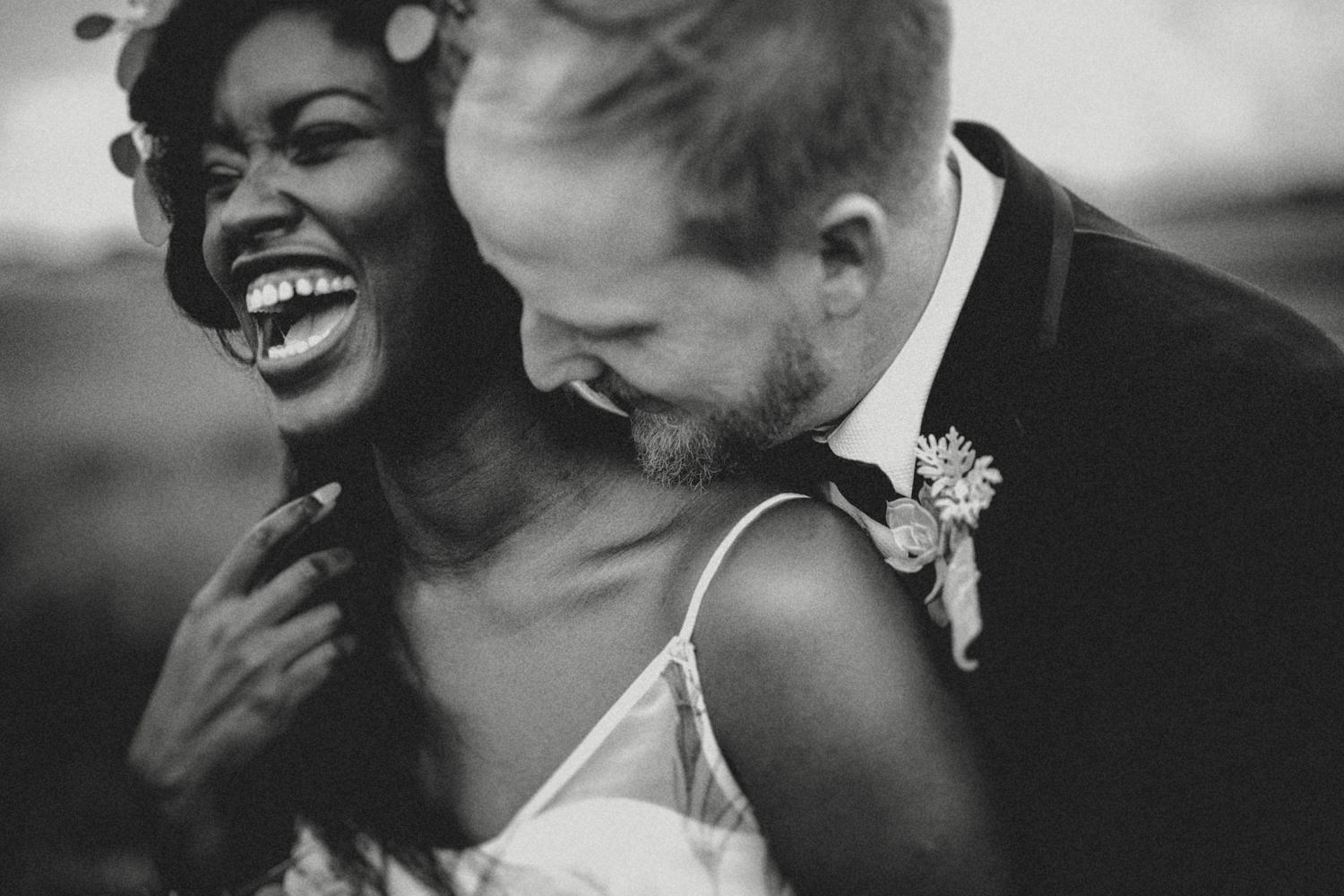 candid moments between alternative couple in a UK wedding