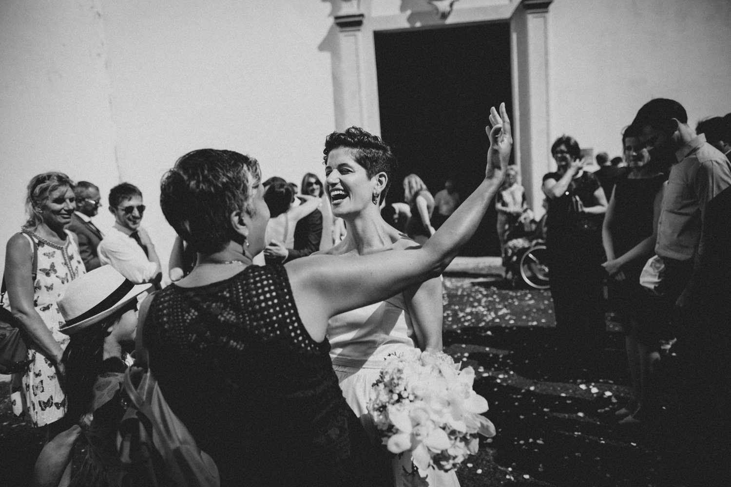 candid moments with short haired bride after a wedding in lisbon lisbon wedding photographers