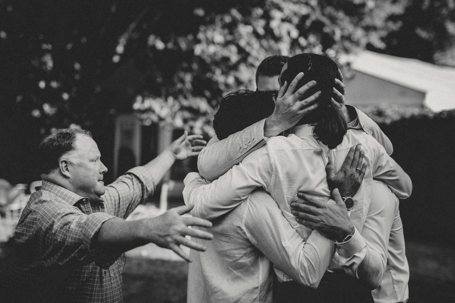 guest hugging after a boho wedding ceremony in portugal